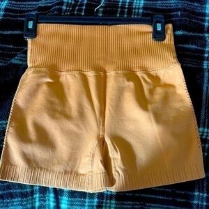 NWOT Zenana Women’s Tan Workout Shorts Size L/XL.